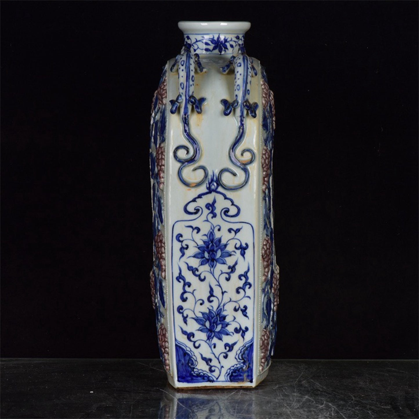 Chinese antique blue and white glazed red relief bottle with multiple grape patterns and a square shape