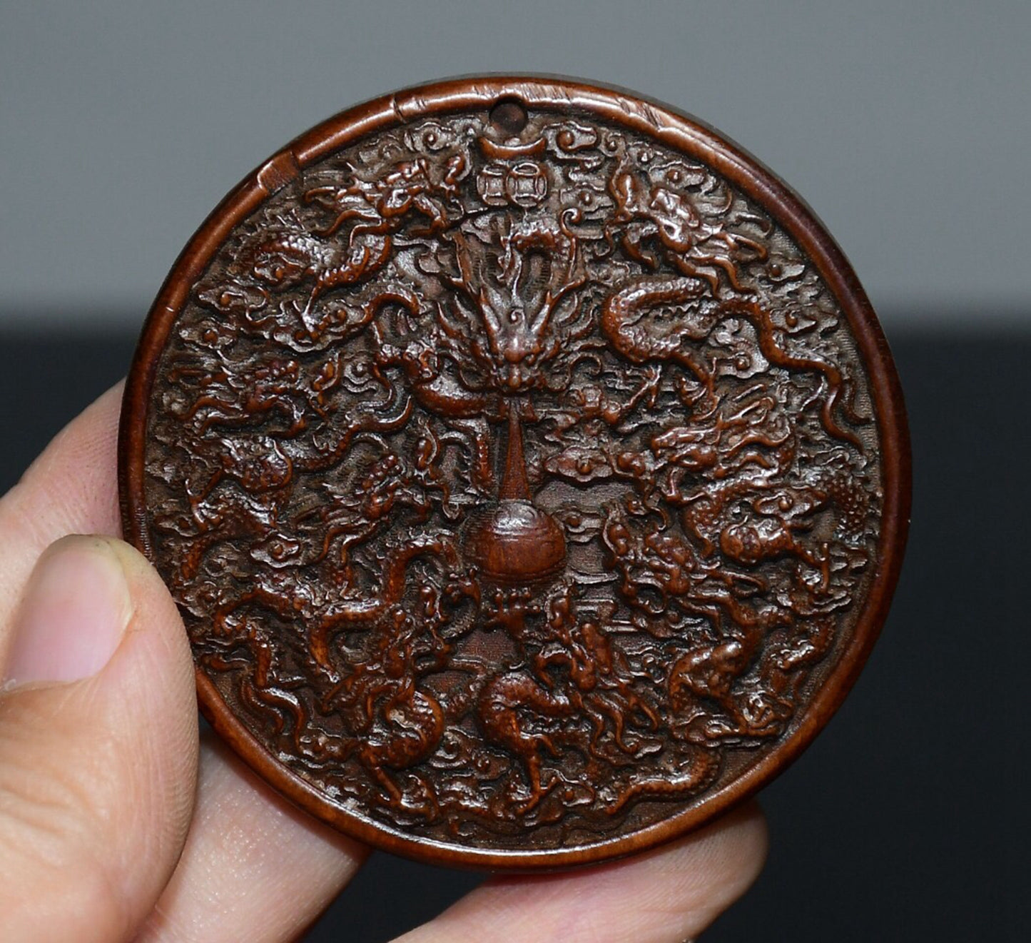 Chinese antique boxwood Nine Dragon pendant