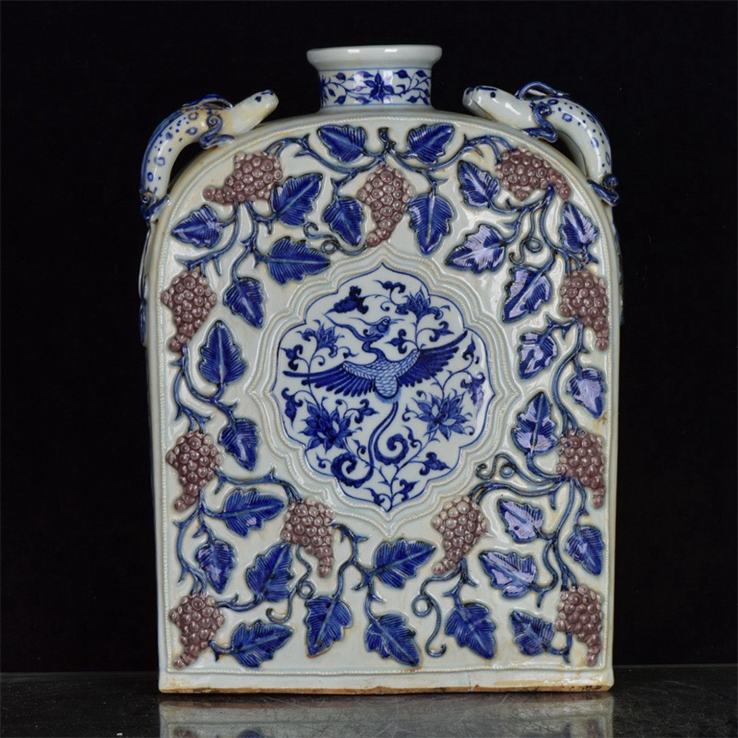 Chinese antique blue and white glazed red relief bottle with multiple grape patterns and a square shape