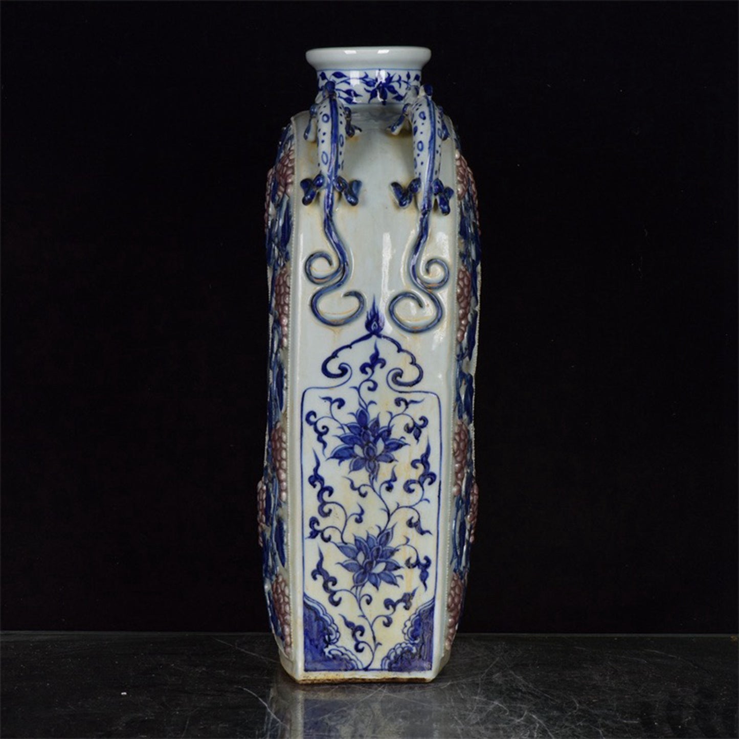 Chinese antique blue and white glazed red relief bottle with multiple grape patterns and a square shape