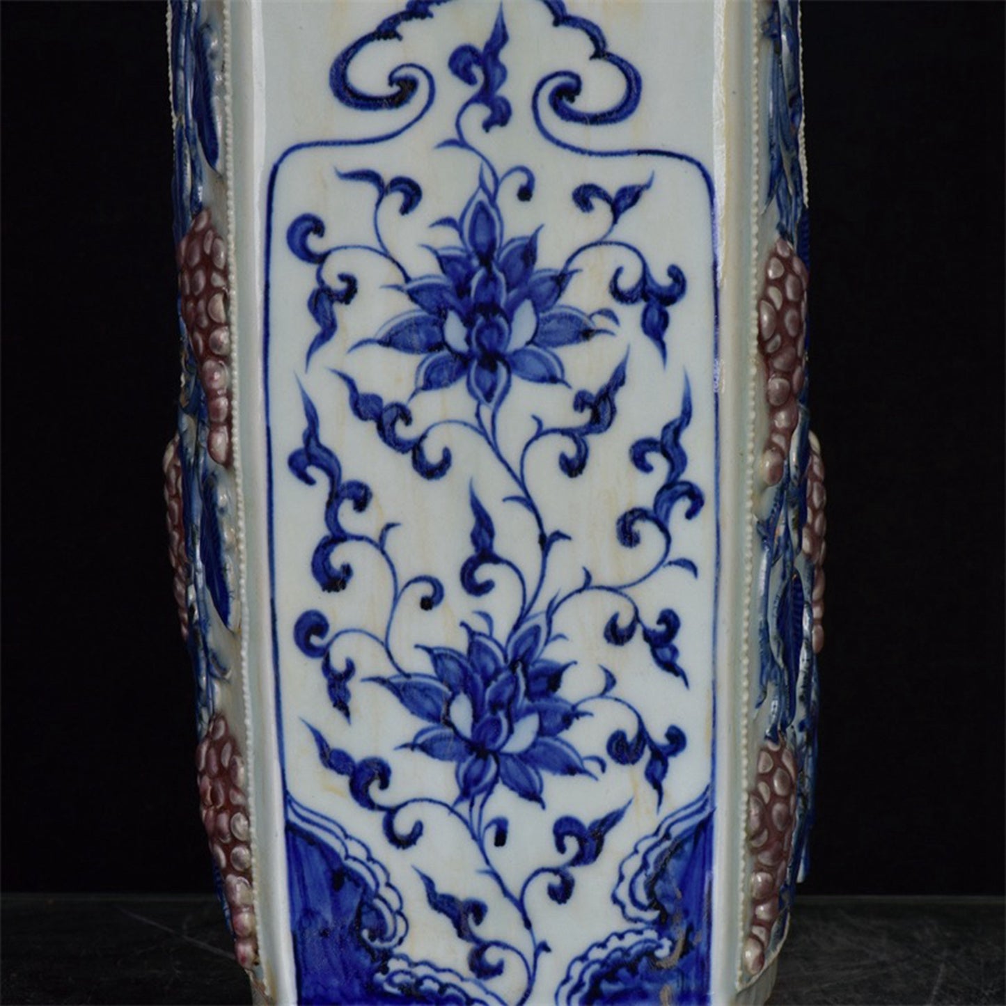 Chinese antique blue and white glazed red relief bottle with multiple grape patterns and a square shape