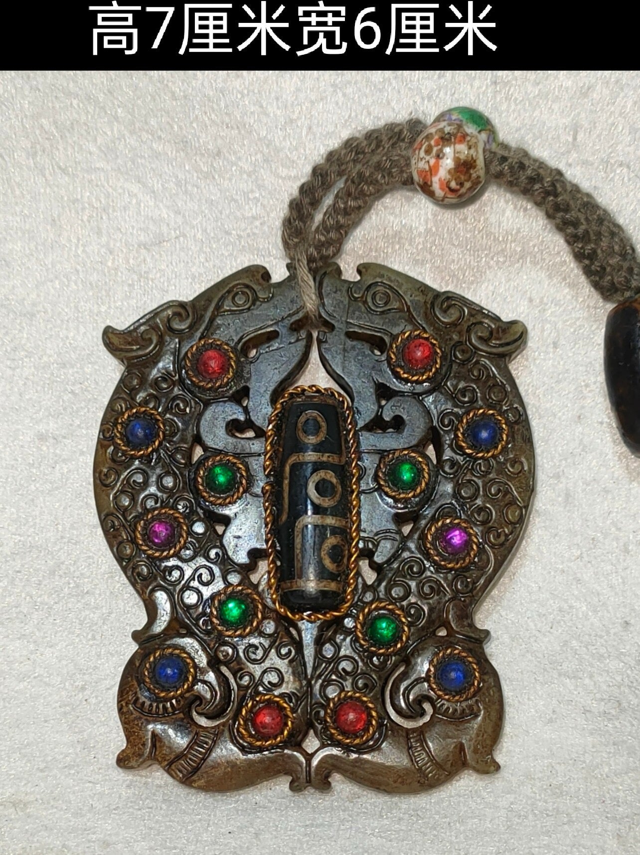 Old jade inlaid with gemstones, heavenly pearls, and turquoise handle pieces