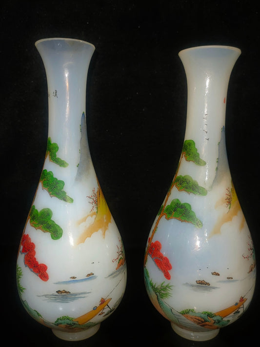 A pair of glass vases