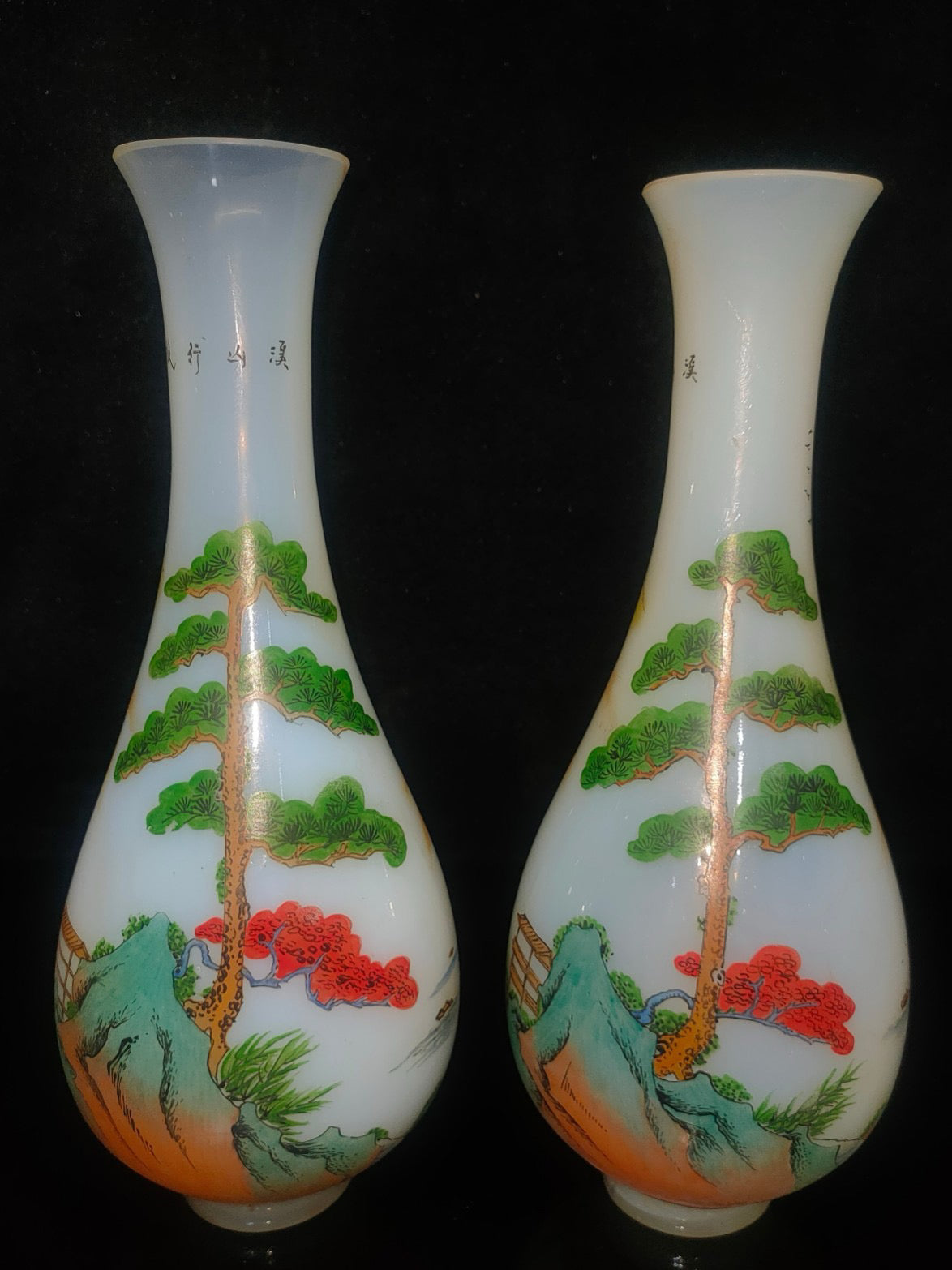 A pair of glass vases