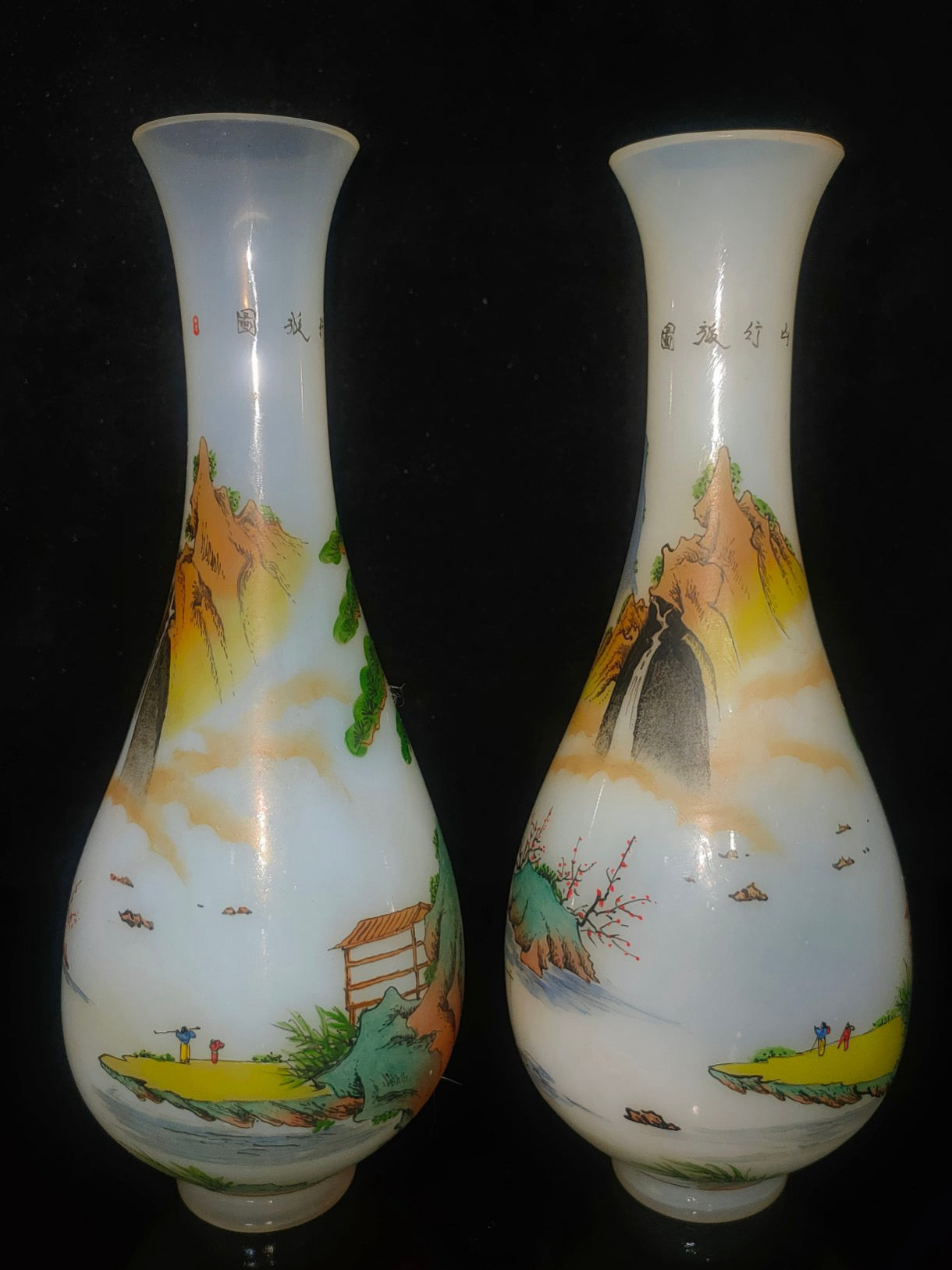 A pair of glass vases