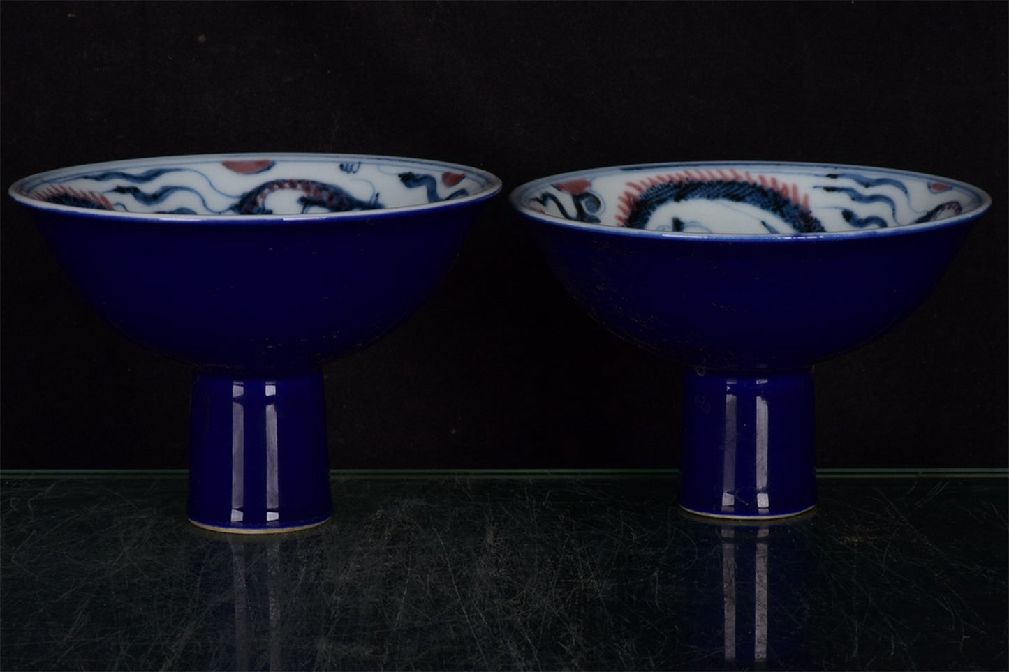Chinese antique blue and white glazed red dragon patterned high legged bowl