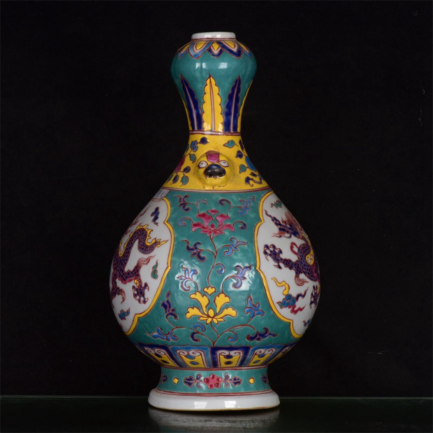 Chinese antique green glazed dragon patterned garlic bottle