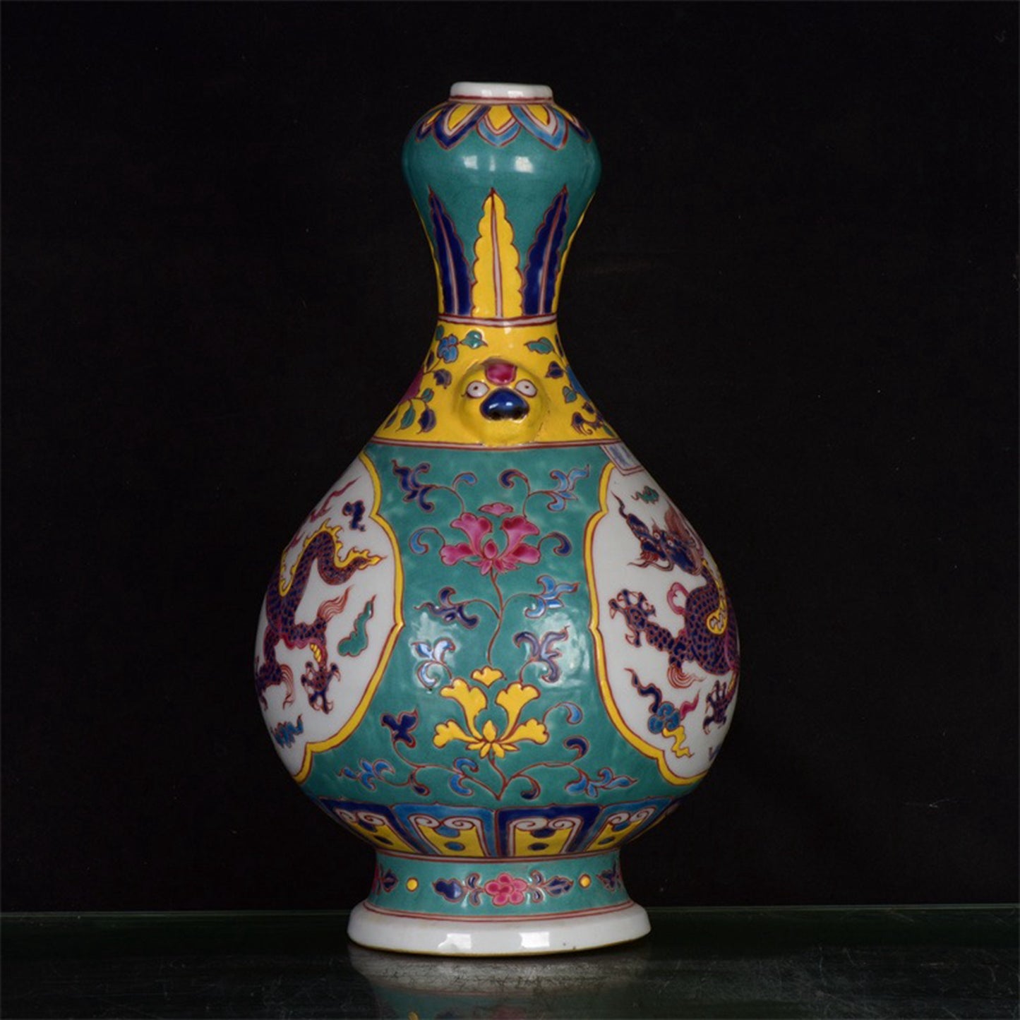 Chinese antique green glazed dragon patterned garlic bottle