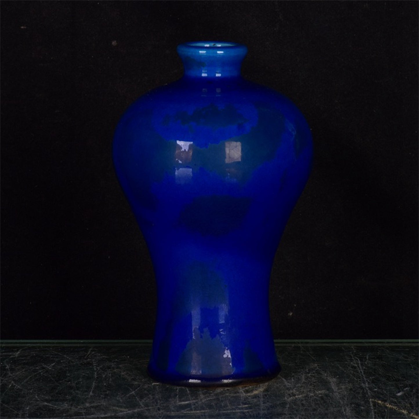 Chinese antique blue glazed open leaf plum vase