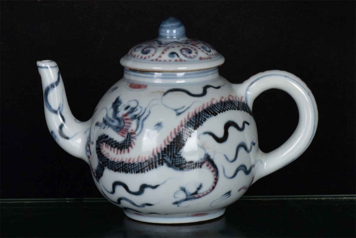 Chinese antique blue and white glazed red dragon patterned teapot