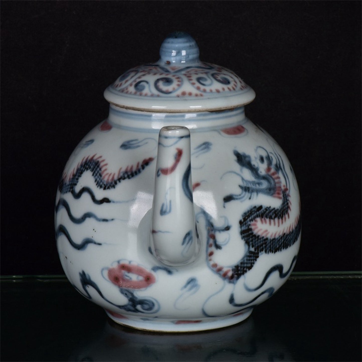 Chinese antique blue and white glazed red dragon patterned teapot