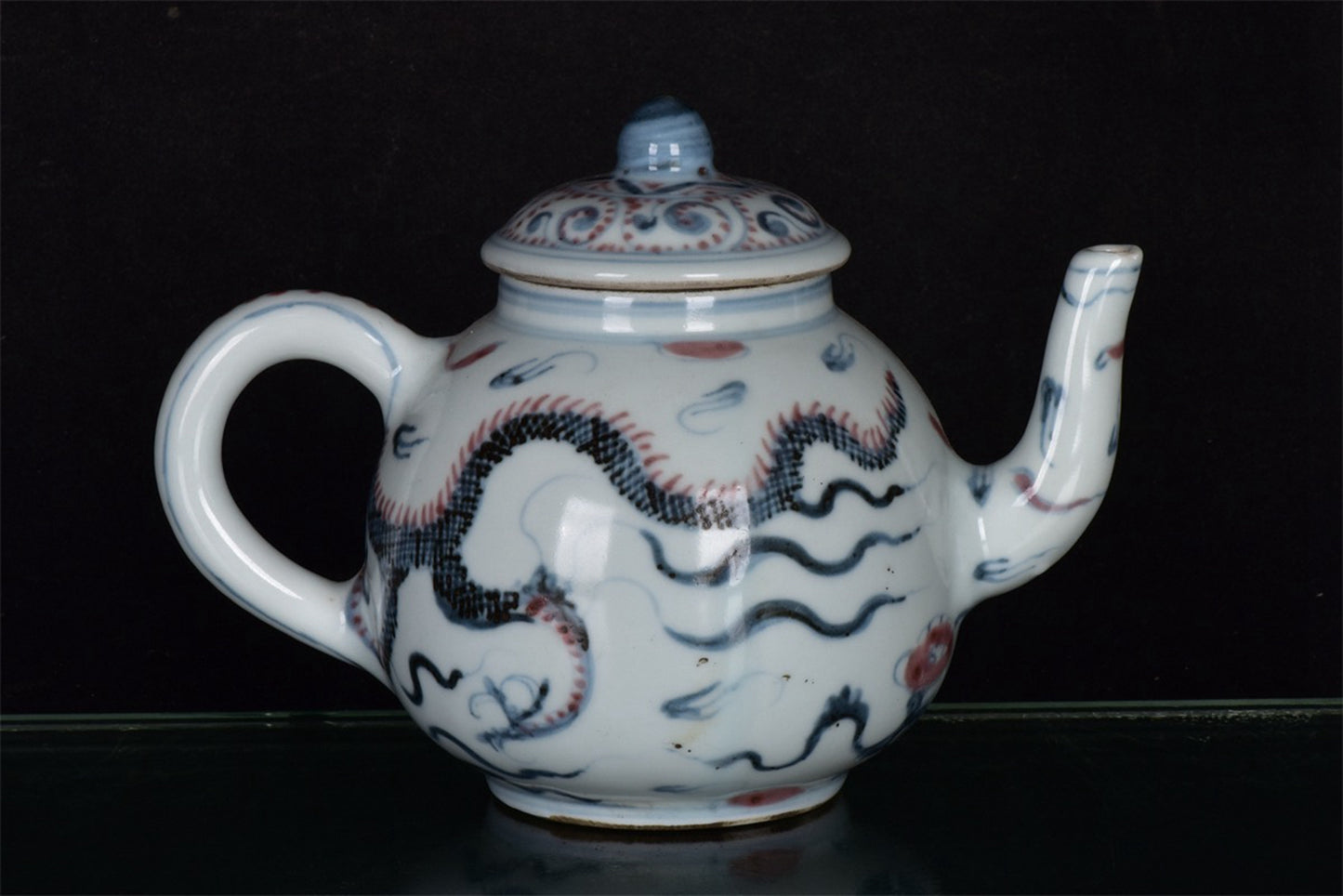 Chinese antique blue and white glazed red dragon patterned teapot
