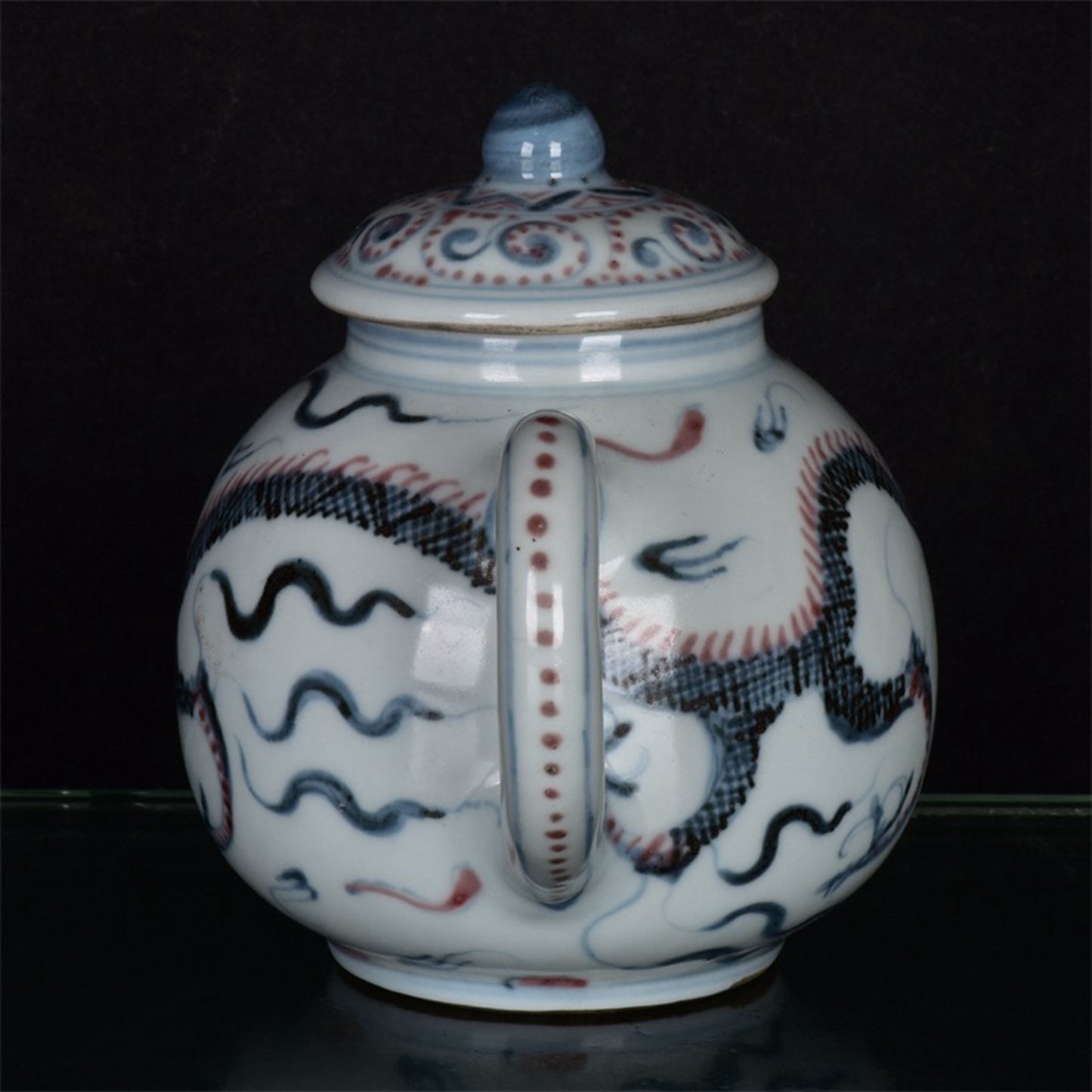 Chinese antique blue and white glazed red dragon patterned teapot