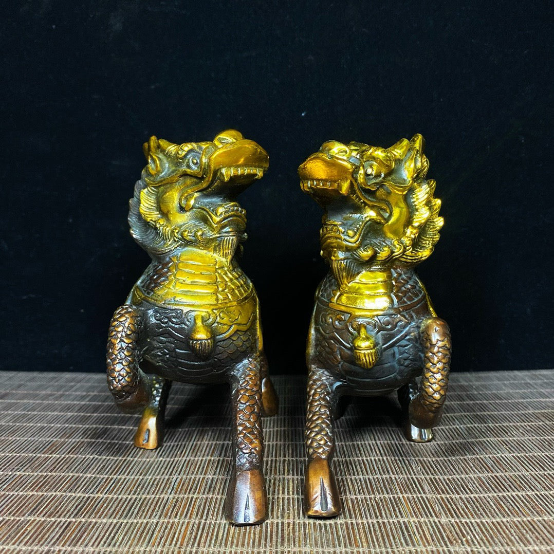 A pair of pure copper gilded and exquisite qilin