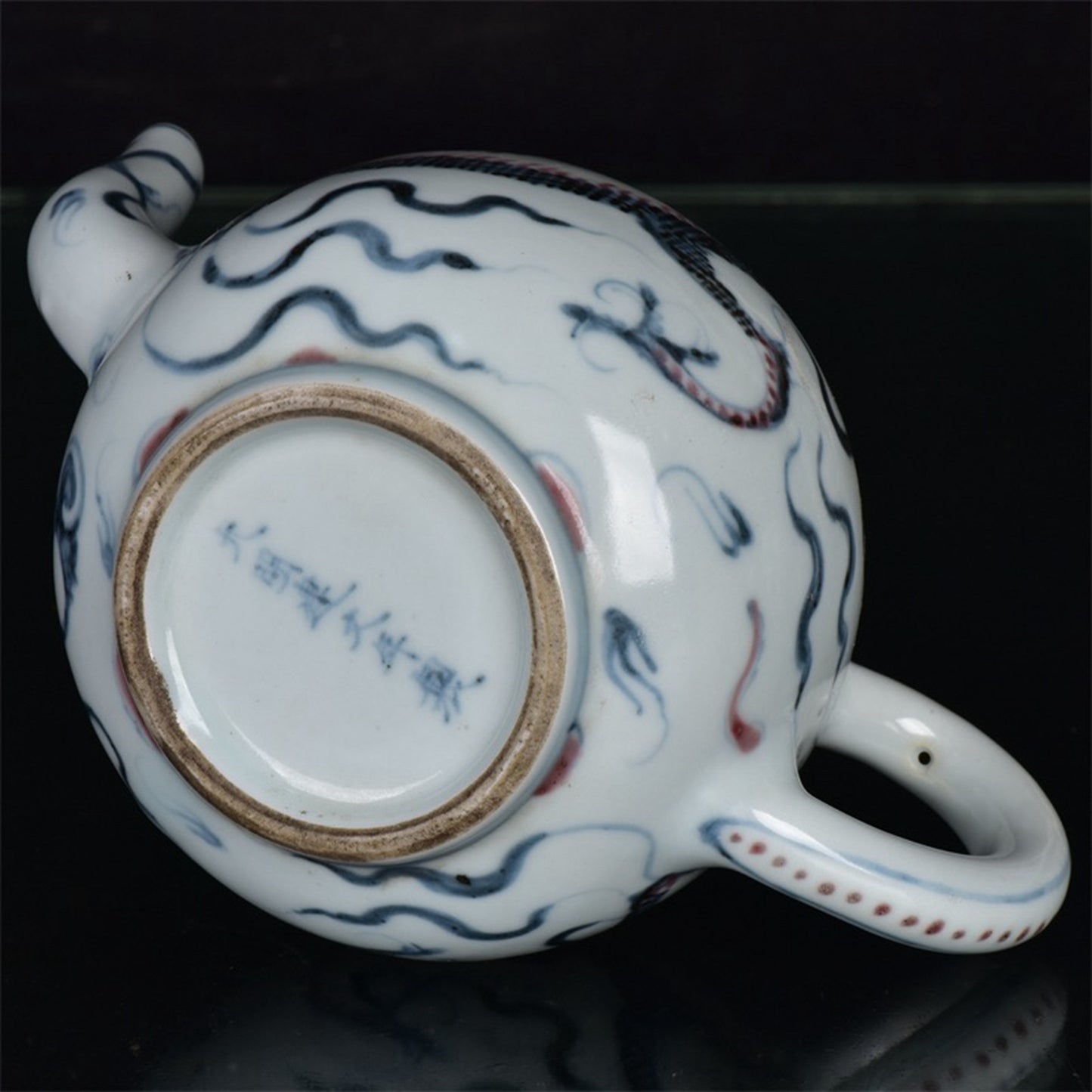 Chinese antique blue and white glazed red dragon patterned teapot