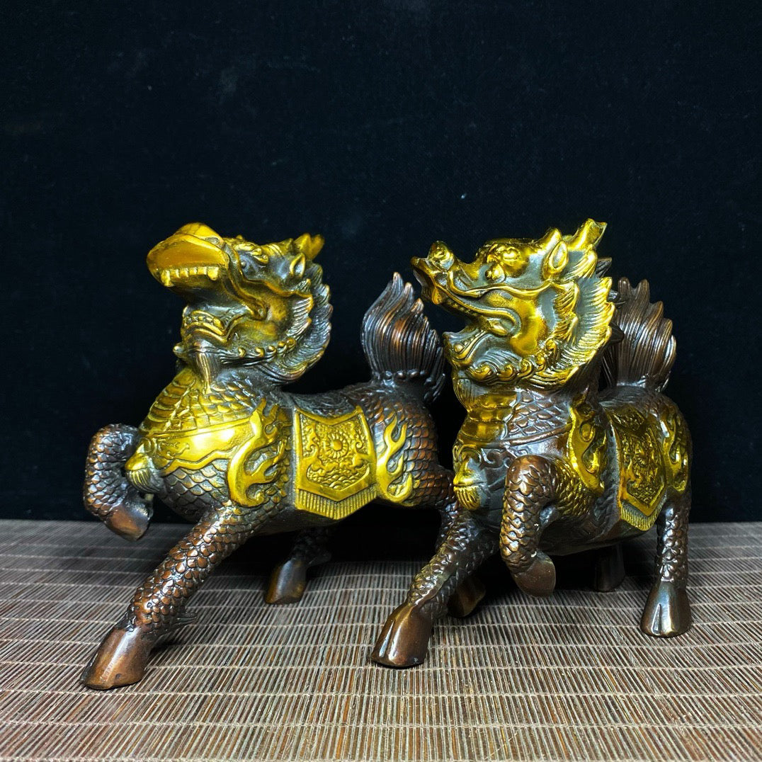 A pair of pure copper gilded and exquisite qilin