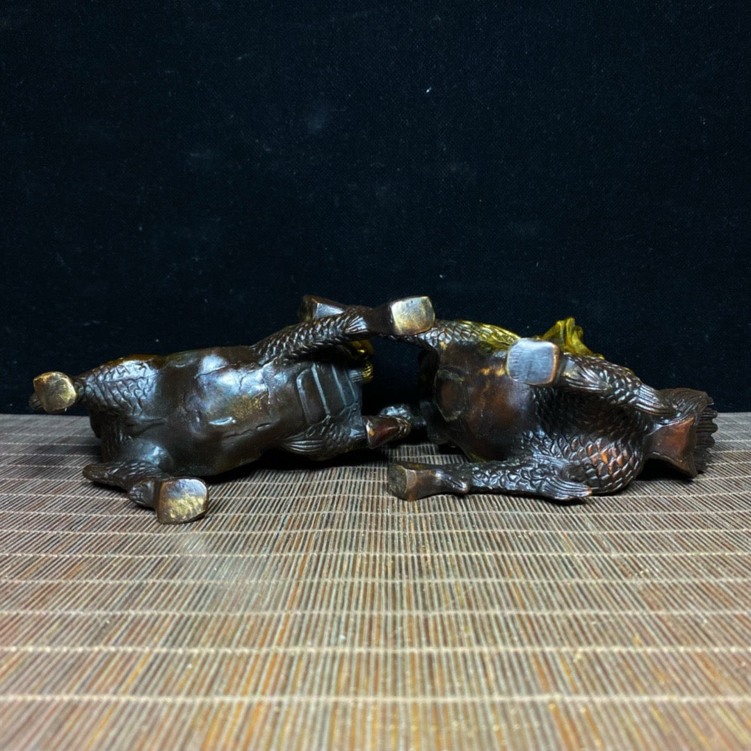 A pair of pure copper gilded and exquisite qilin