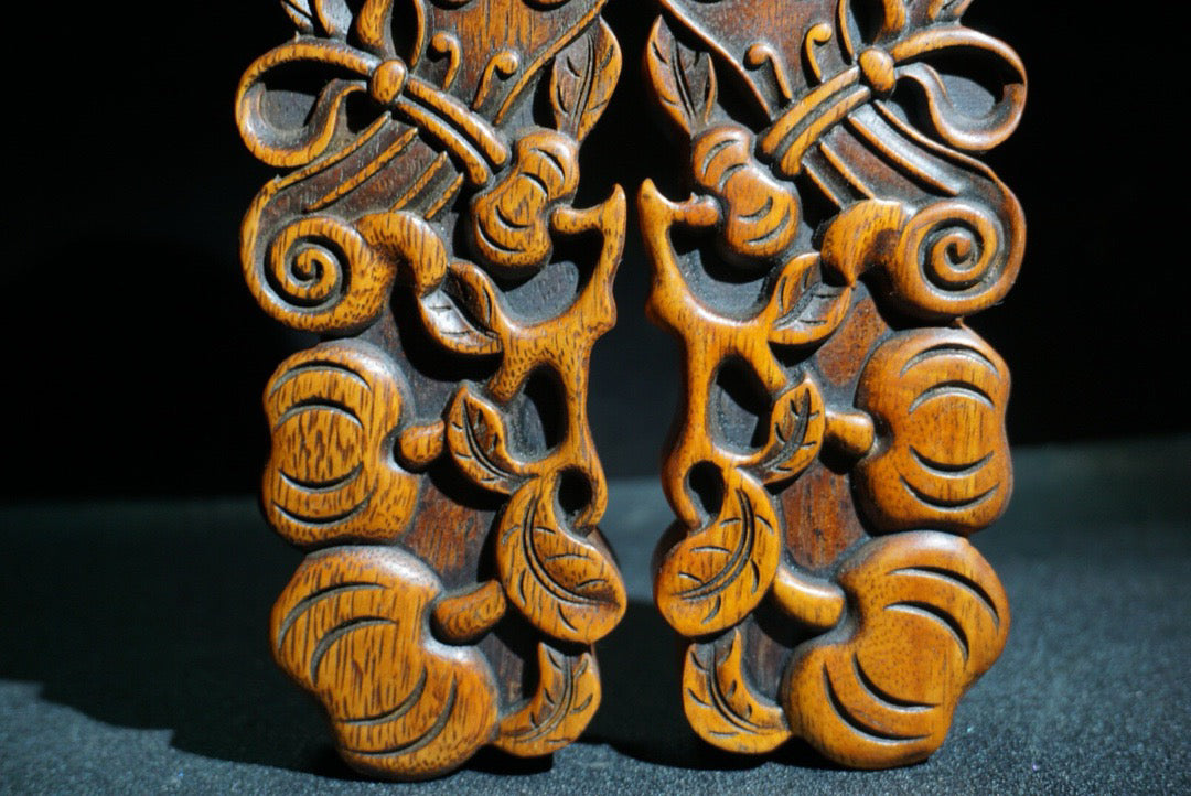 A pair of Chinese antique pear wood carved weighing scales