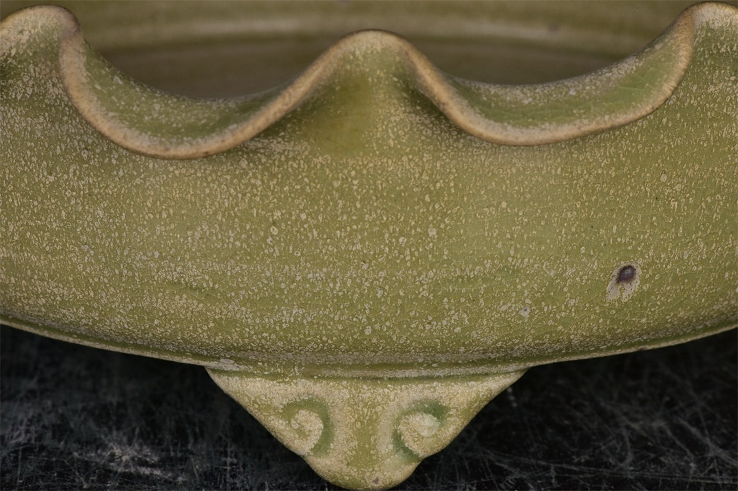 Chinese antique relief flower mouth three legged wash
