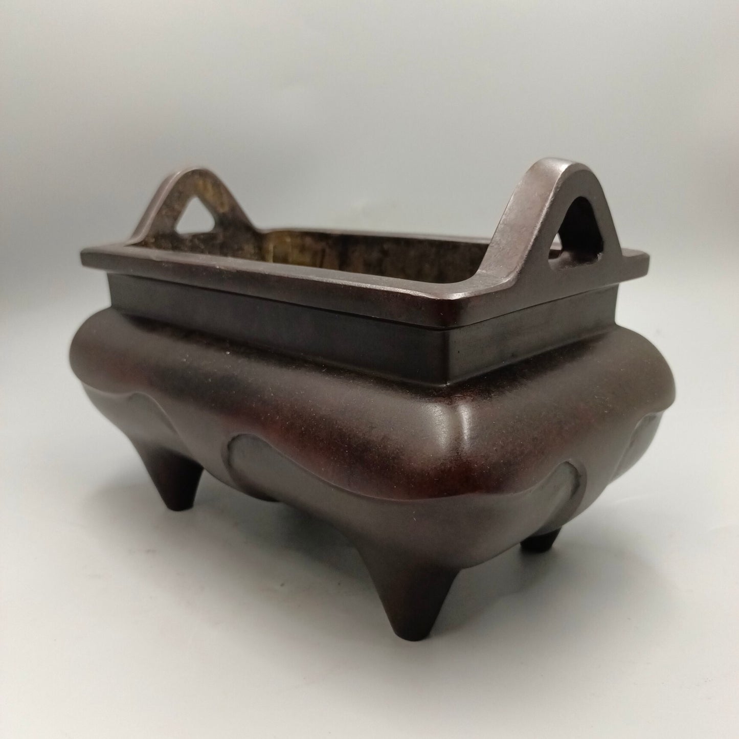 Chinese antique four legged smooth copper tripod