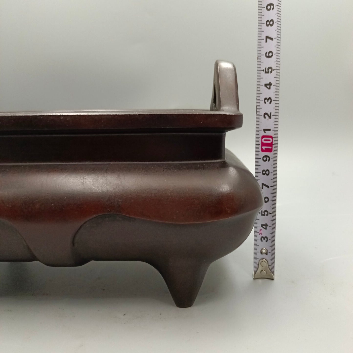 Chinese antique four legged smooth copper tripod