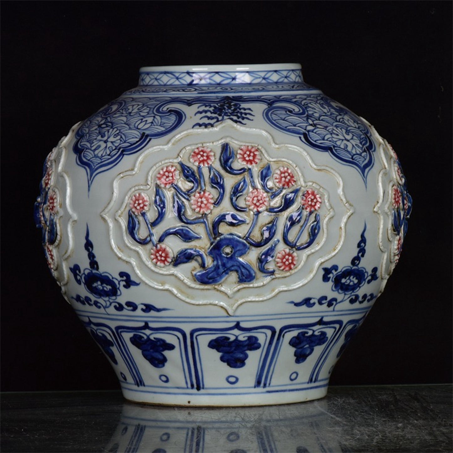 Chinese antique blue and white glazed red flower jar