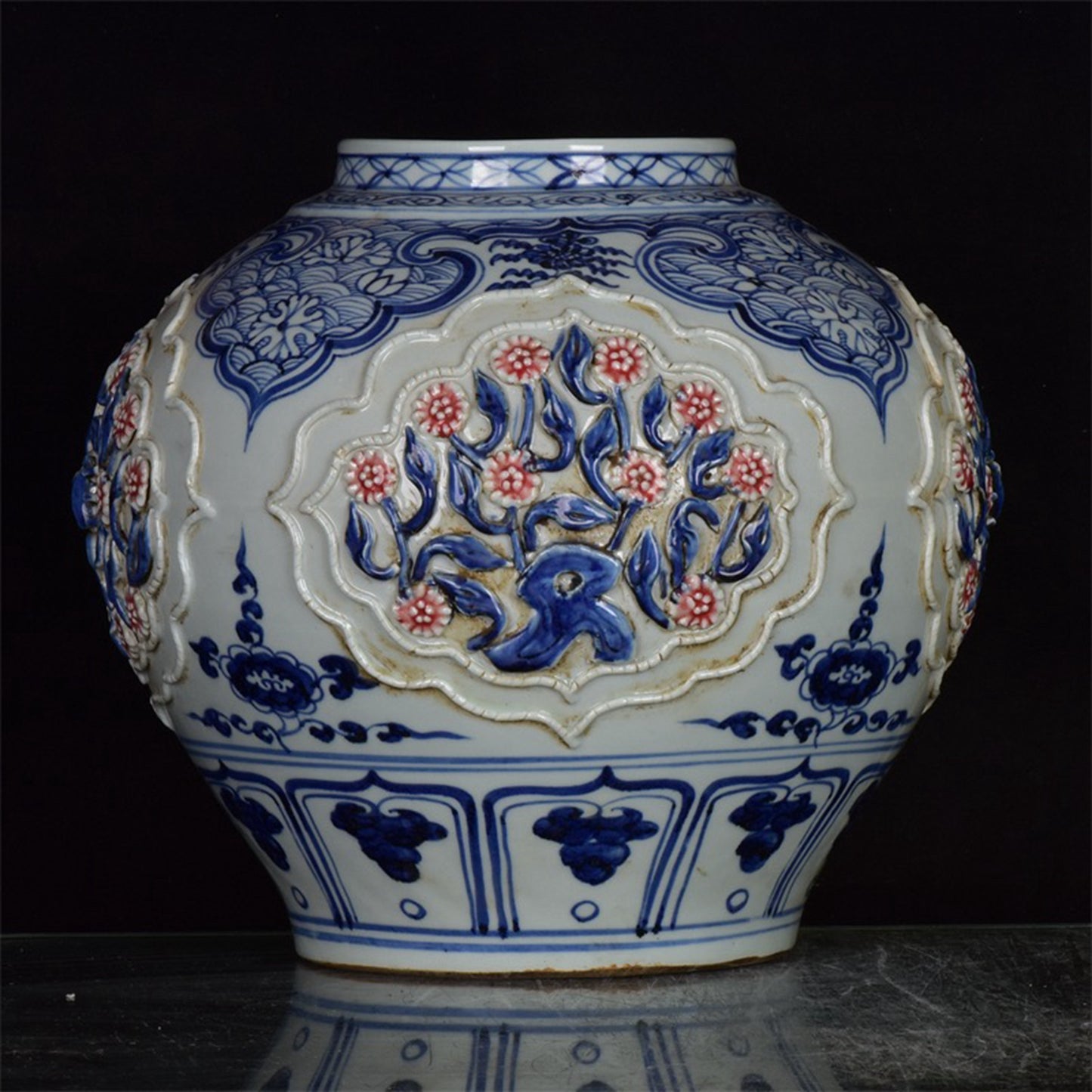 Chinese antique blue and white glazed red flower jar