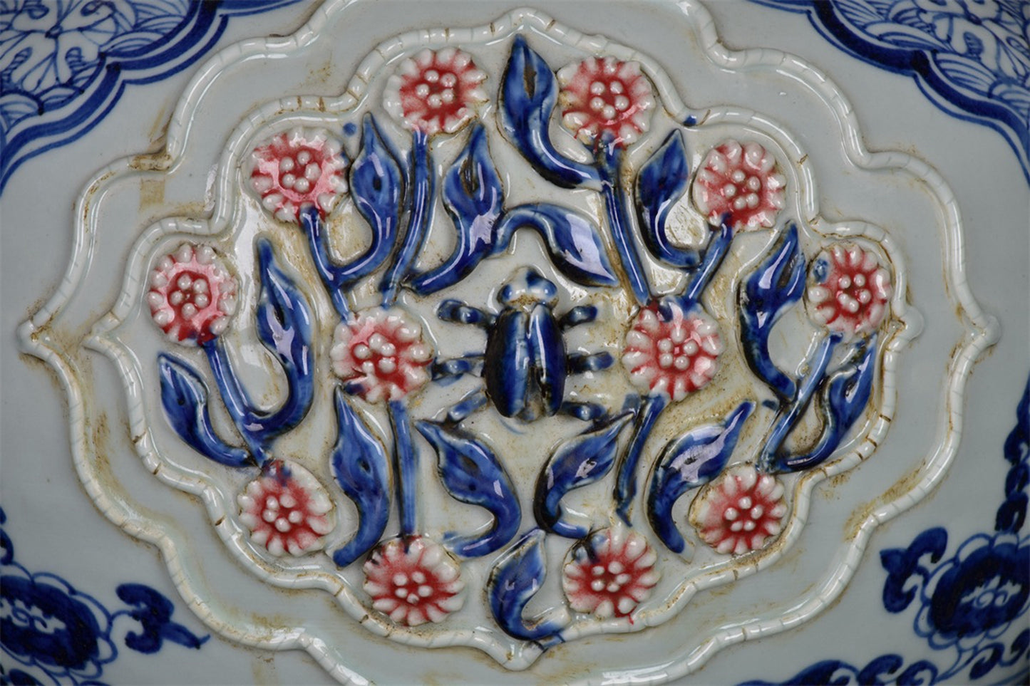 Chinese antique blue and white glazed red flower jar