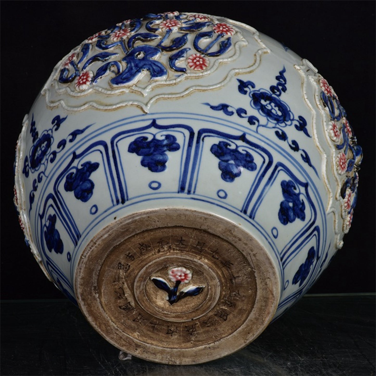 Chinese antique blue and white glazed red flower jar