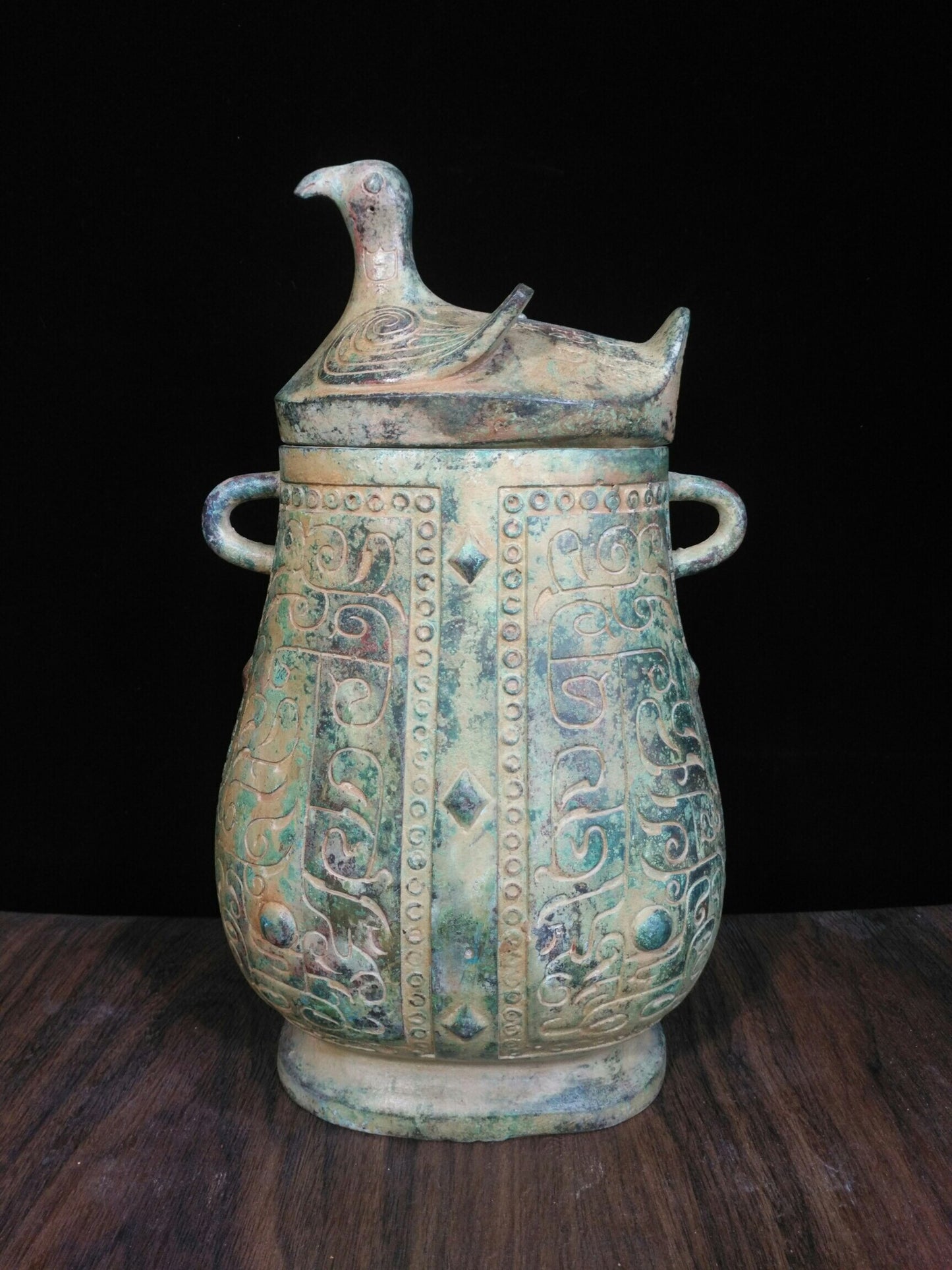 Chinese antique bronze teapot with deformed bird cover and animal pattern