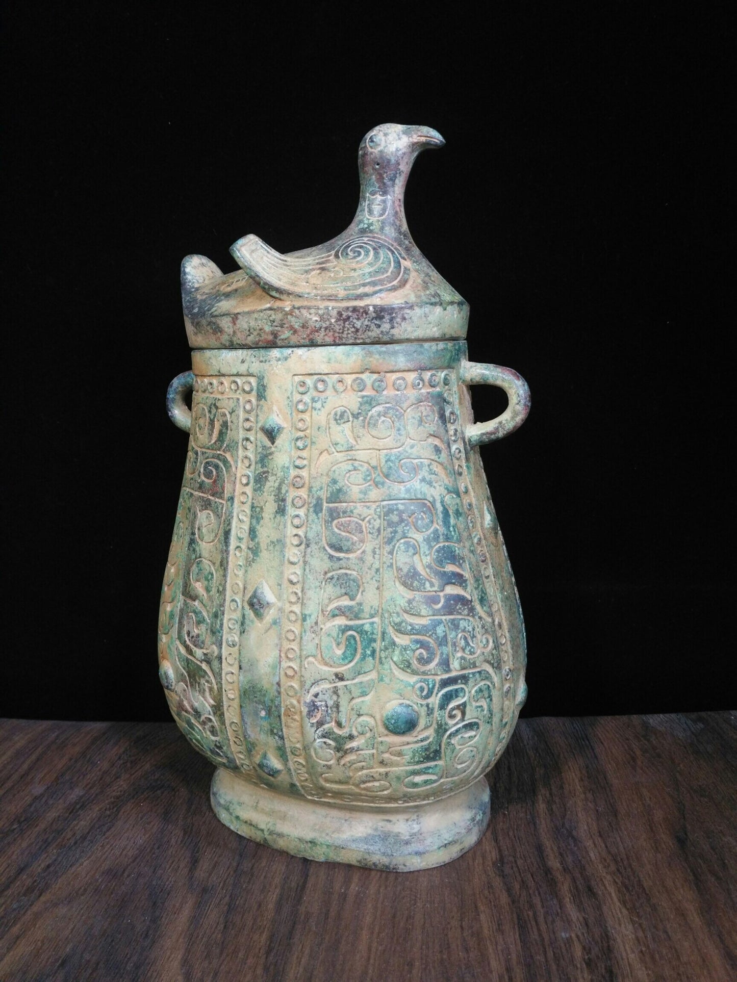 Chinese antique bronze teapot with deformed bird cover and animal pattern