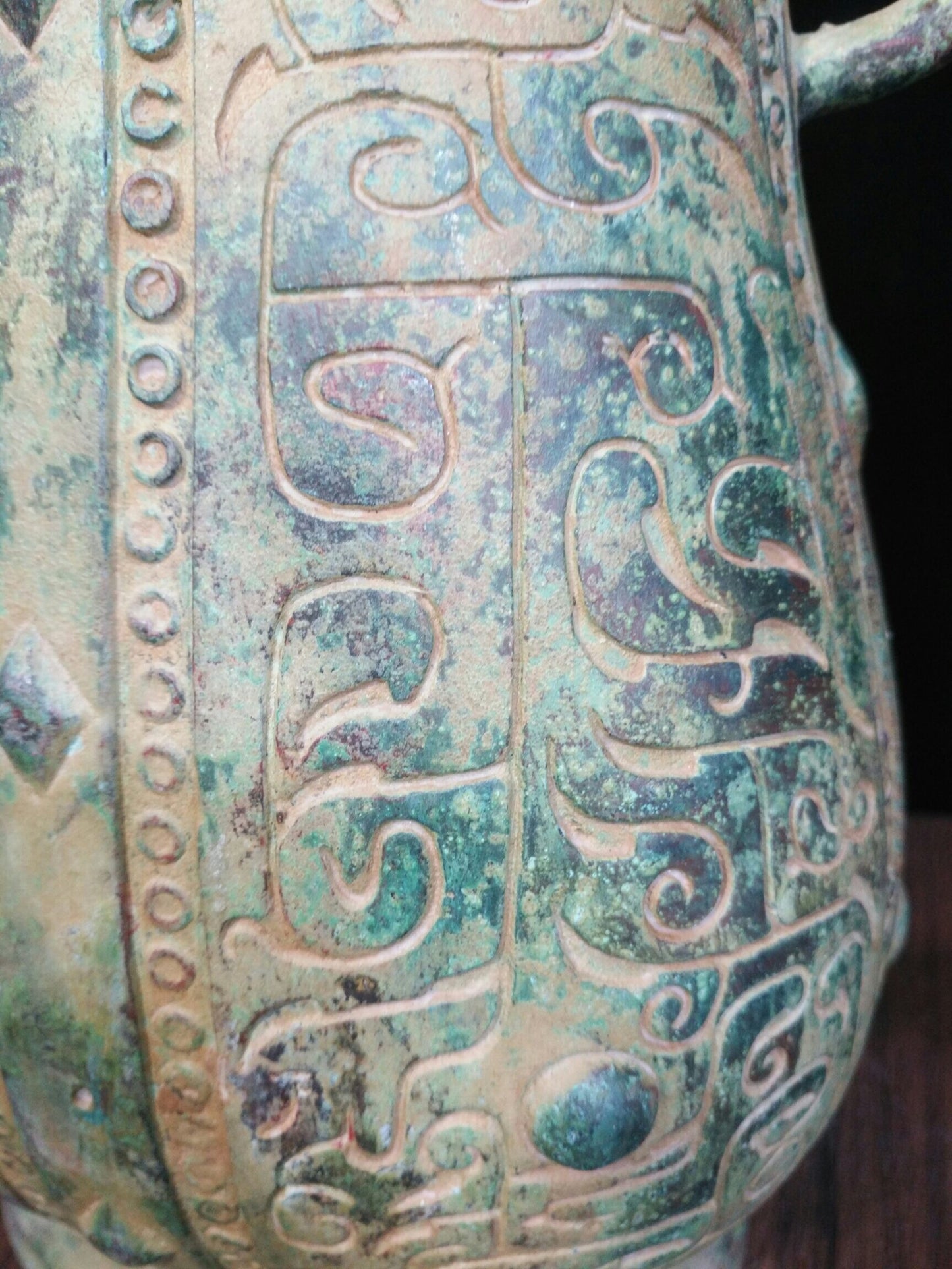 Chinese antique bronze teapot with deformed bird cover and animal pattern