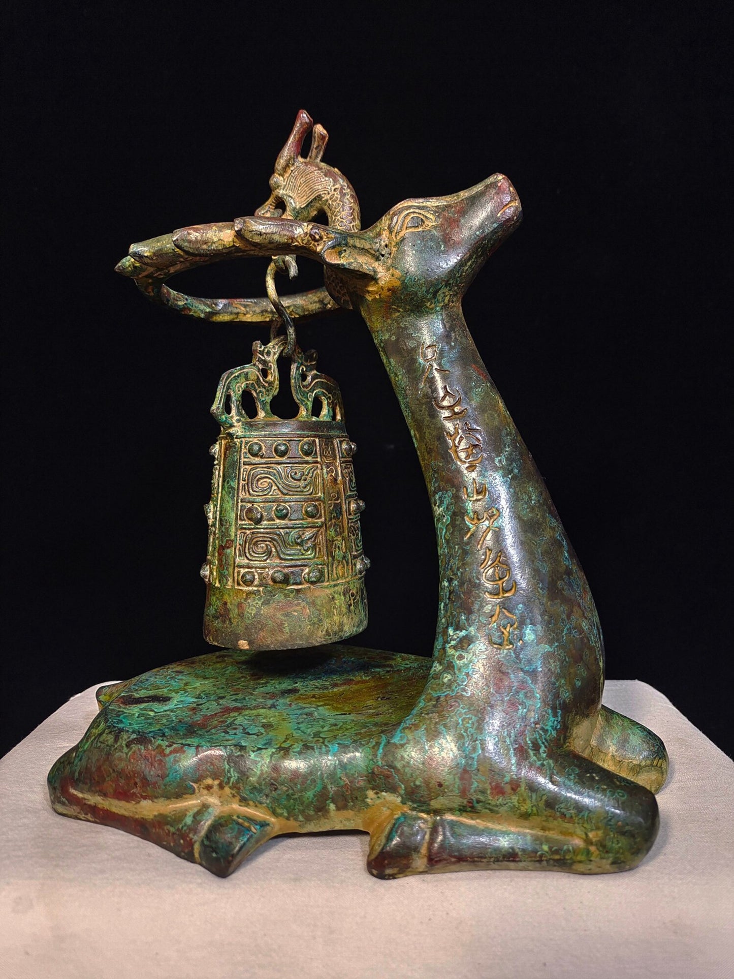 Chinese antique bronze "Kneeling Deer and Bow Bell"