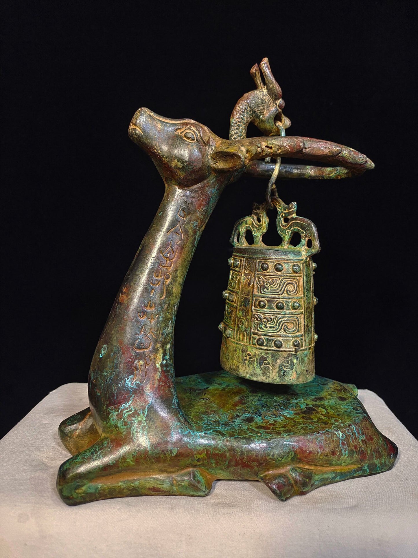Chinese antique bronze "Kneeling Deer and Bow Bell"