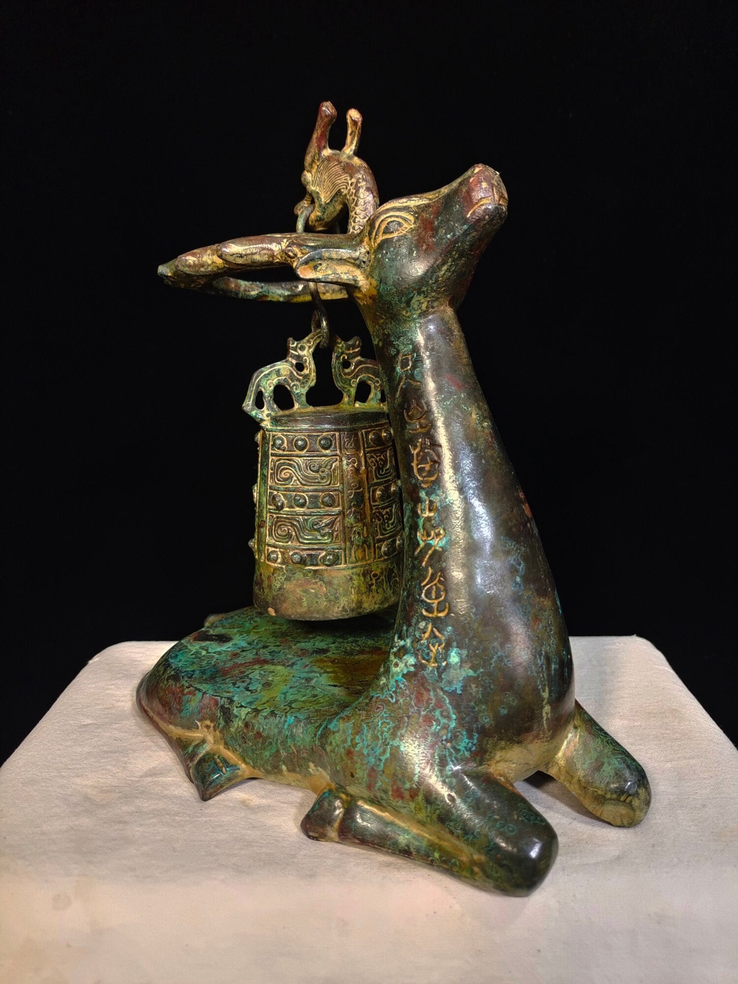 Chinese antique bronze "Kneeling Deer and Bow Bell"