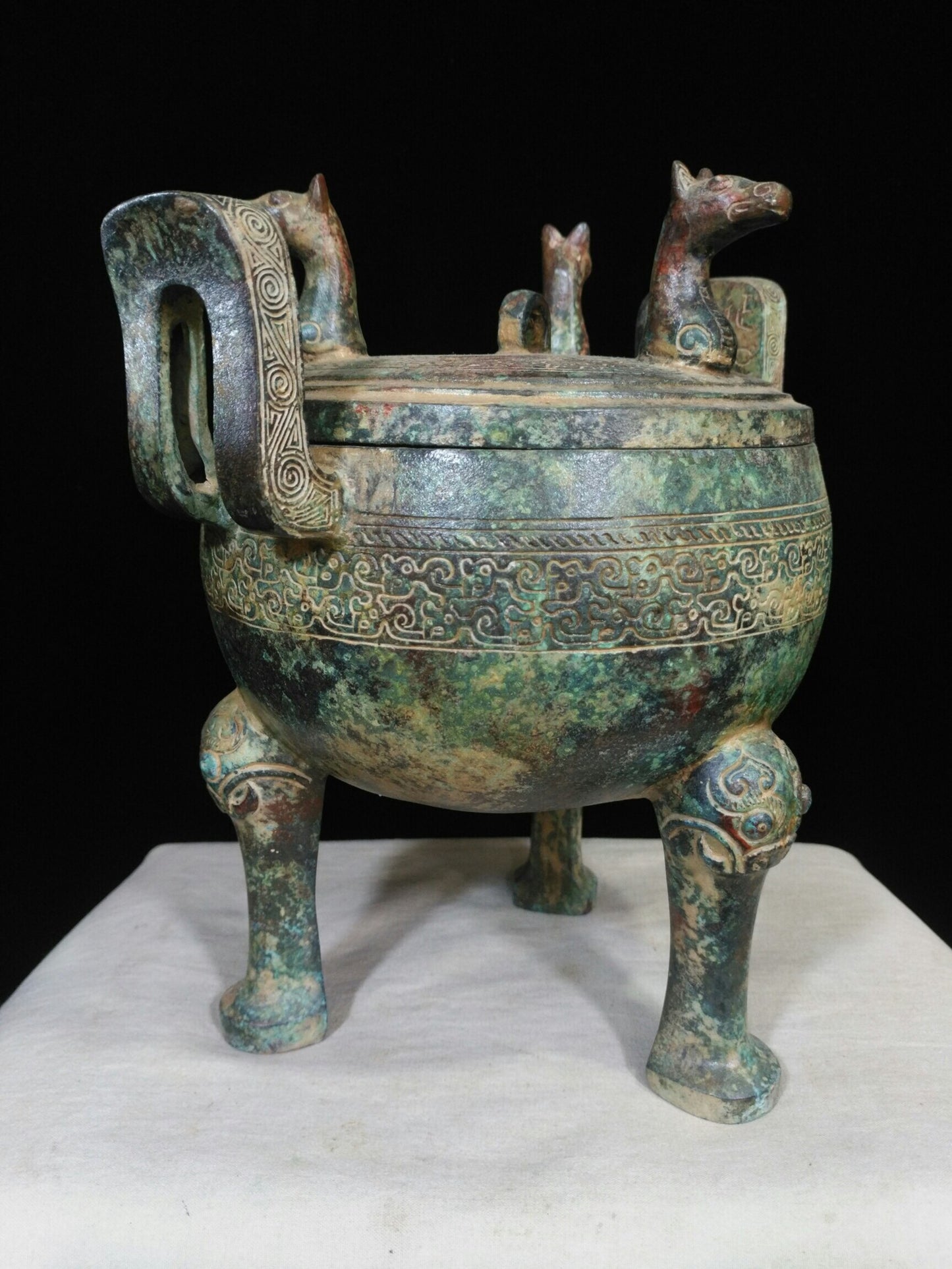 Chinese antique "Three Horse Headed Round Cauldron"