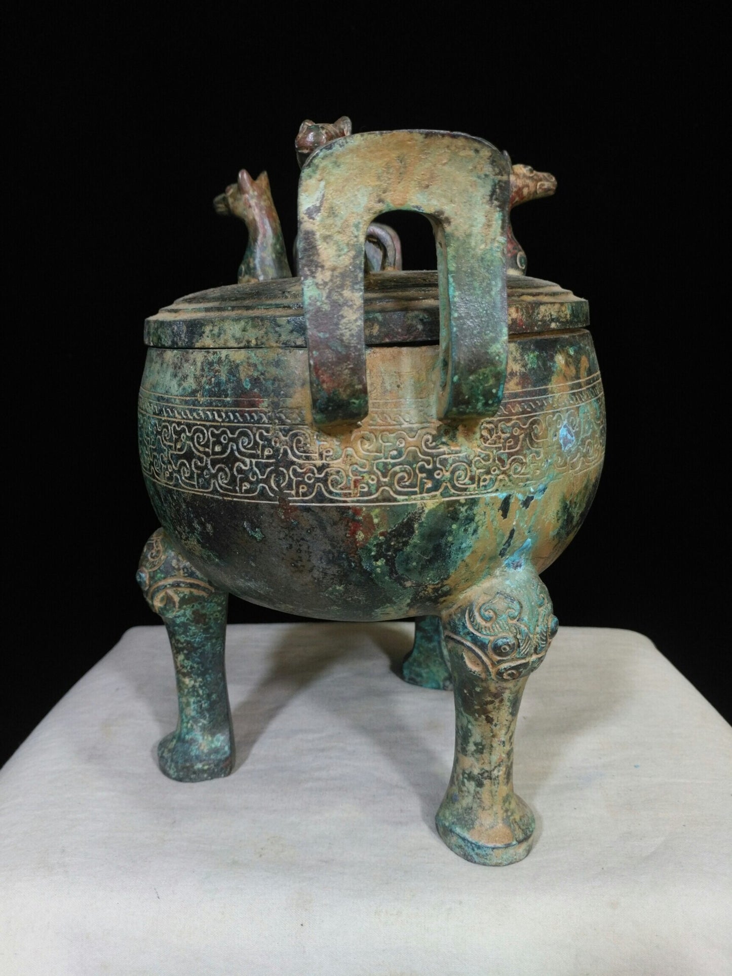 Chinese antique "Three Horse Headed Round Cauldron"