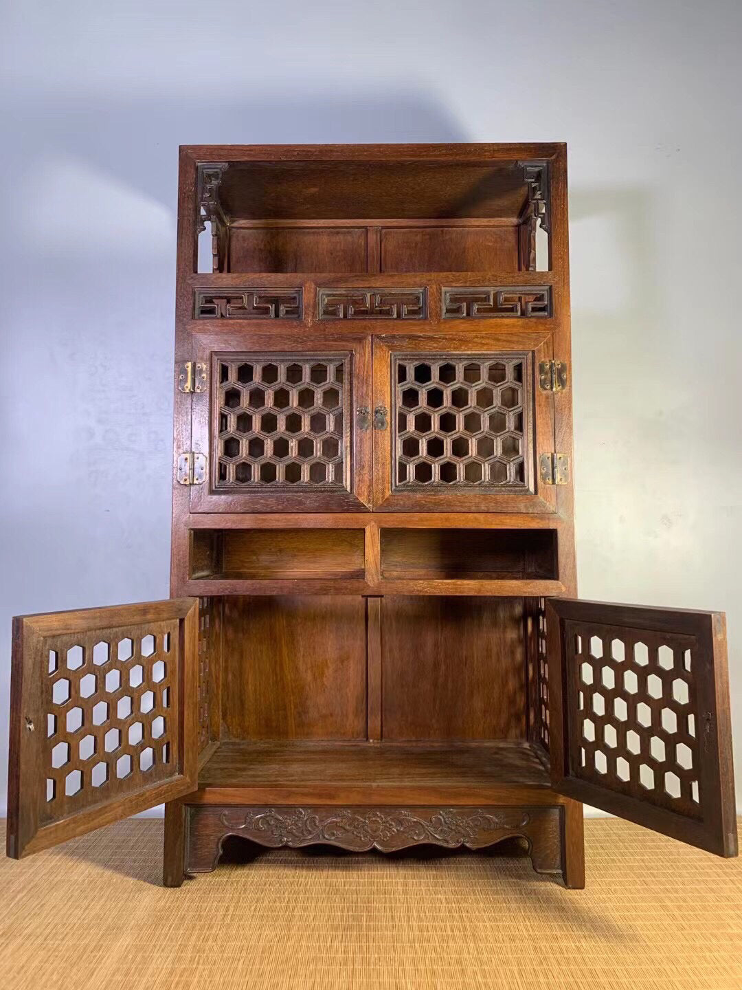 Chinese antique pear wood hollow tea cabinet
