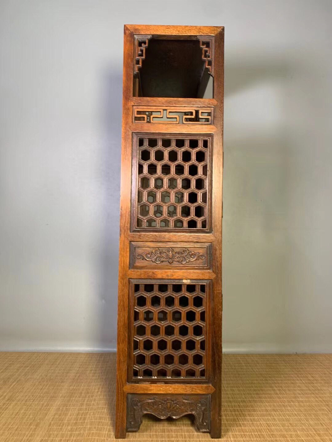 Chinese antique pear wood hollow tea cabinet