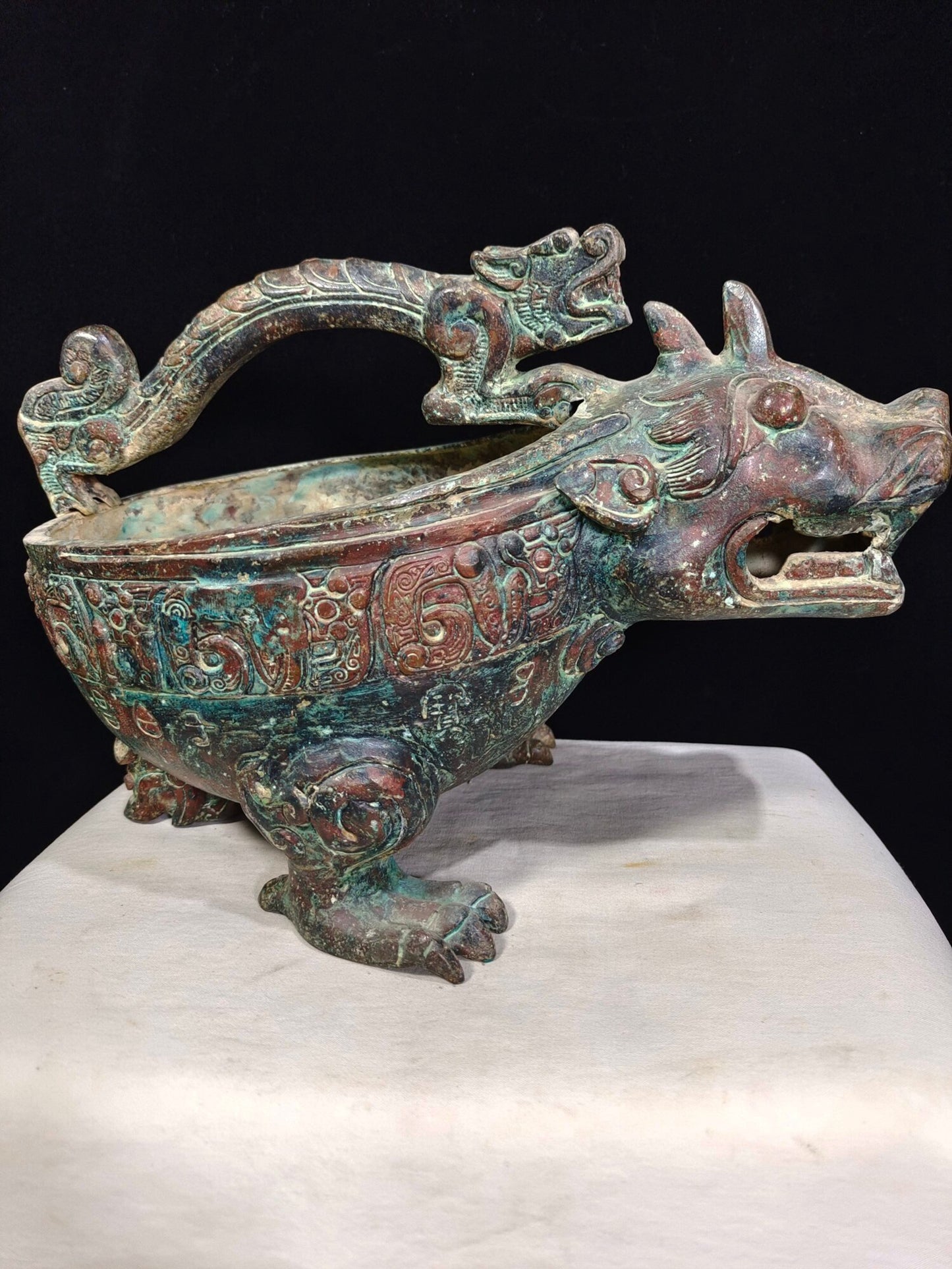 Chinese antique bronze "Tiger Headed Grass"