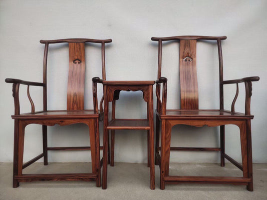 A set of Chinese antique rosewood official hat chairs