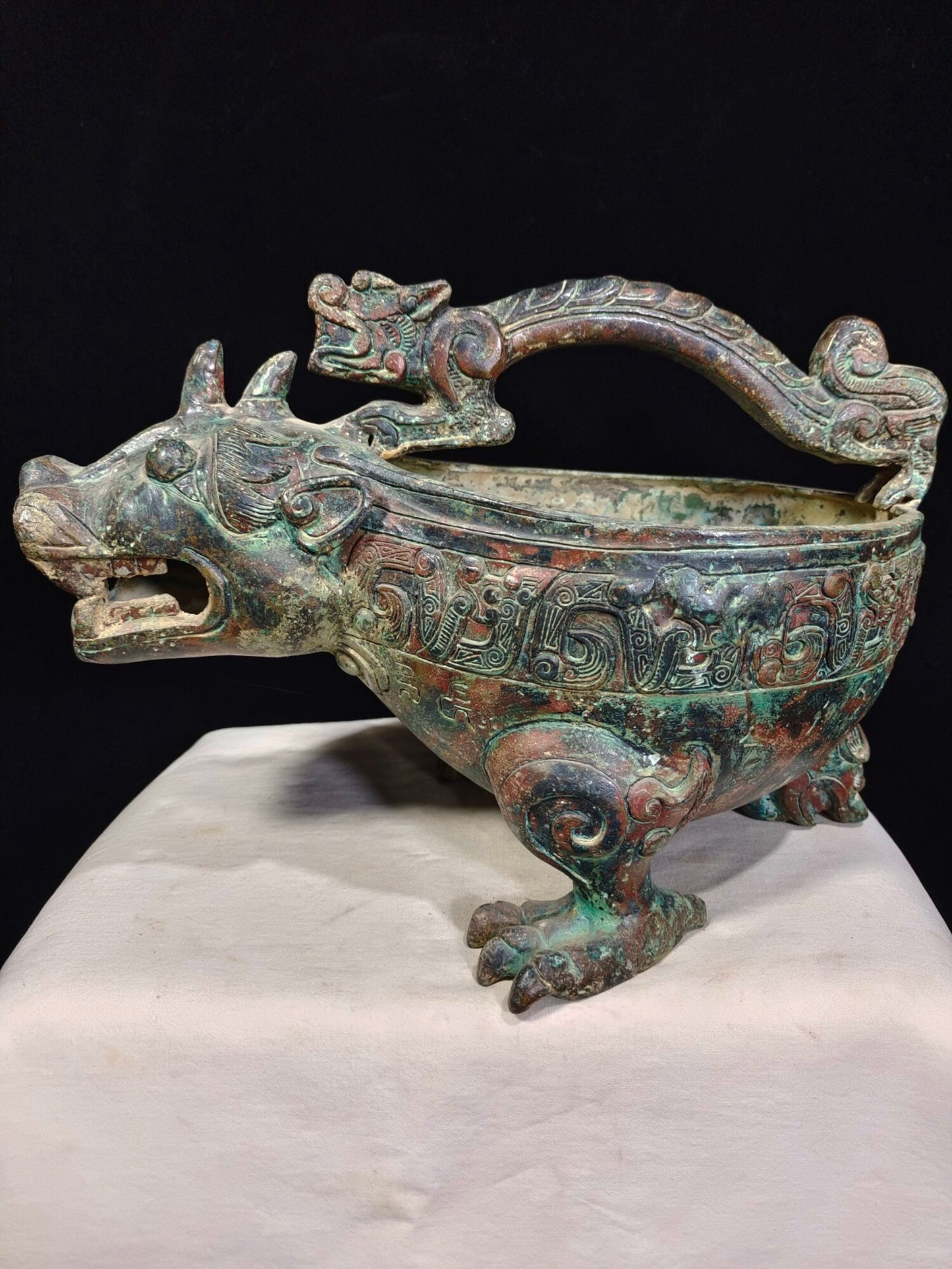 Chinese antique bronze "Tiger Headed Grass"