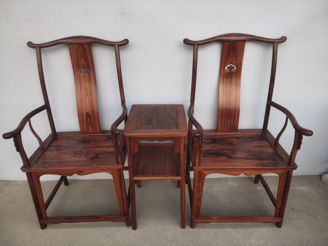 A set of Chinese antique rosewood official hat chairs