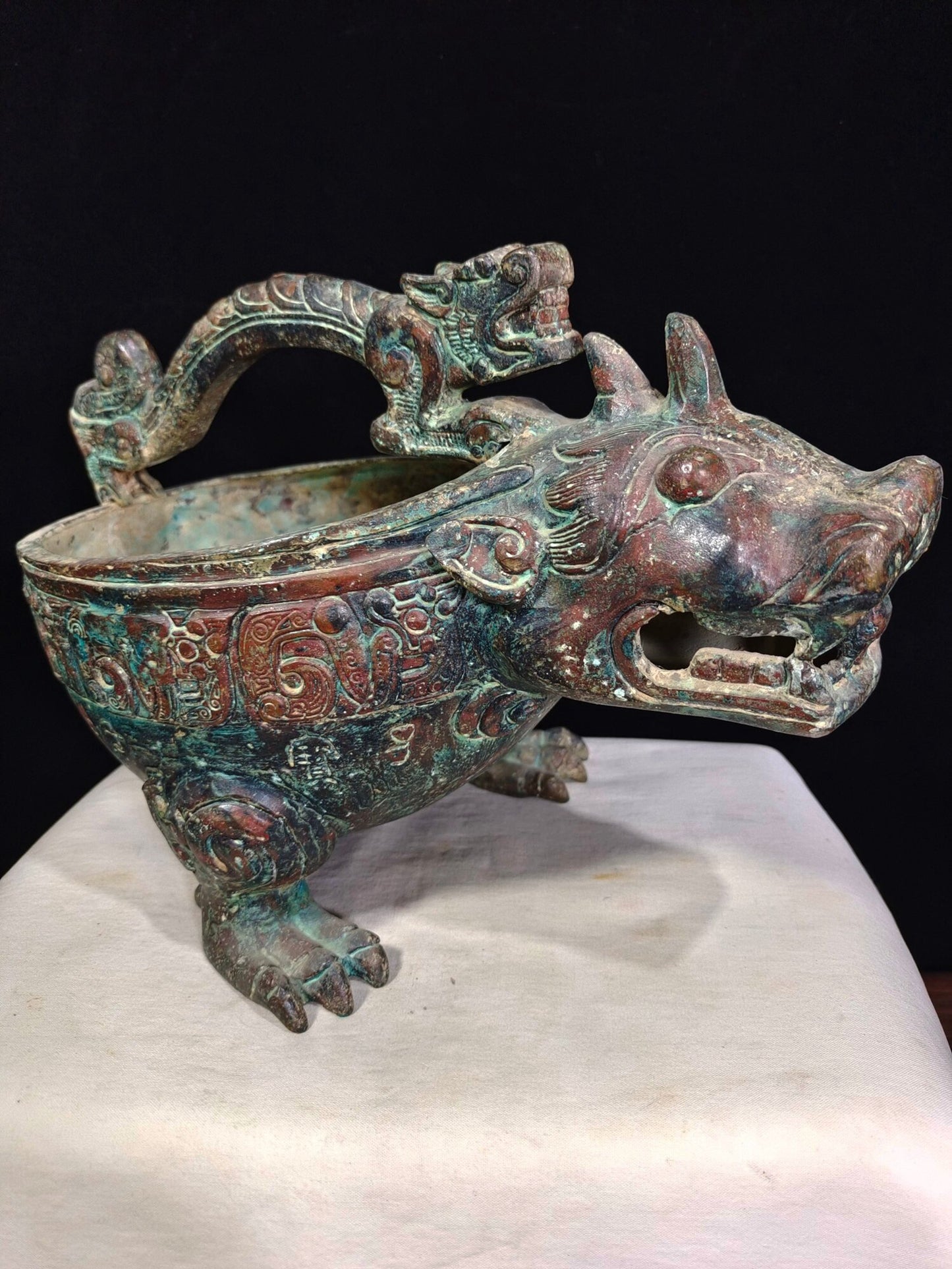 Chinese antique bronze "Tiger Headed Grass"