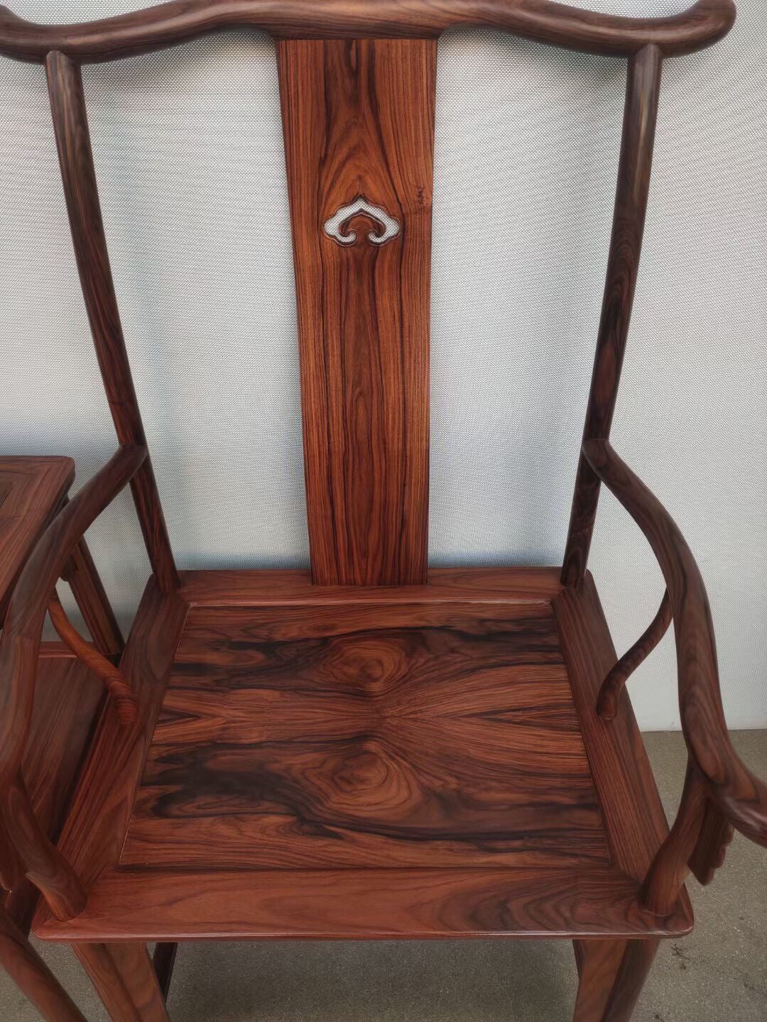 A set of Chinese antique rosewood official hat chairs