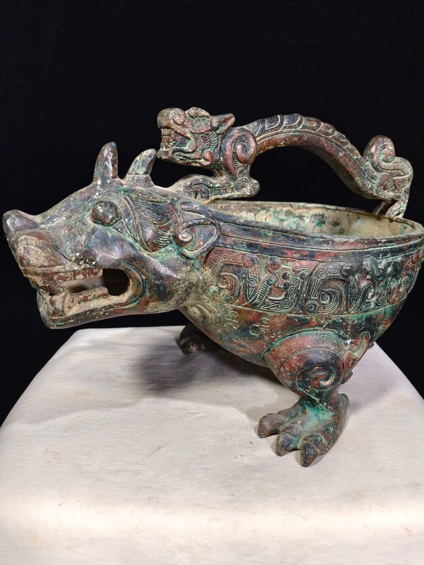 Chinese antique bronze "Tiger Headed Grass"