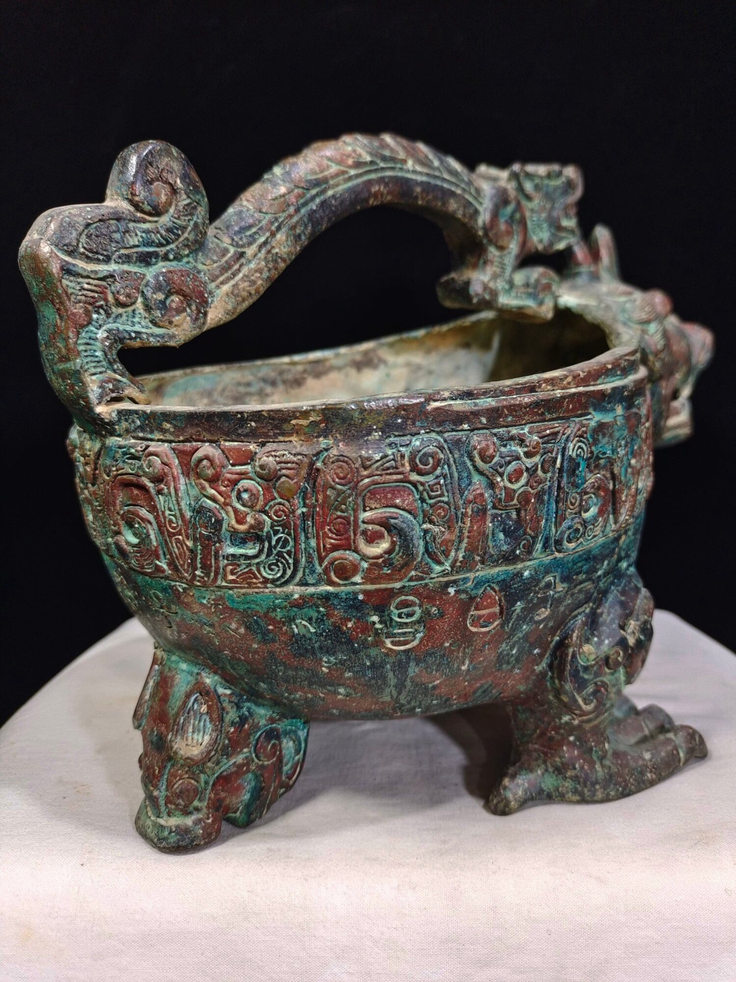 Chinese antique bronze "Tiger Headed Grass"