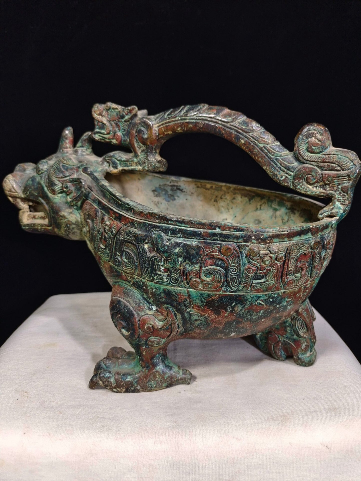 Chinese antique bronze "Tiger Headed Grass"