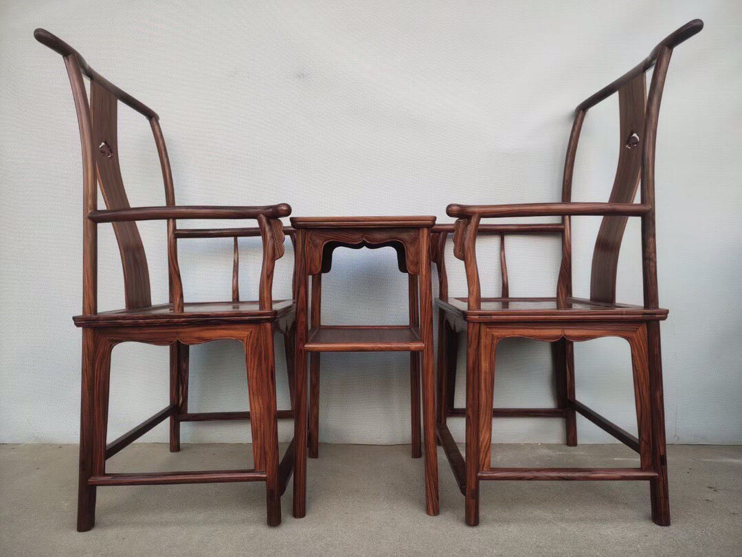 A set of Chinese antique rosewood official hat chairs