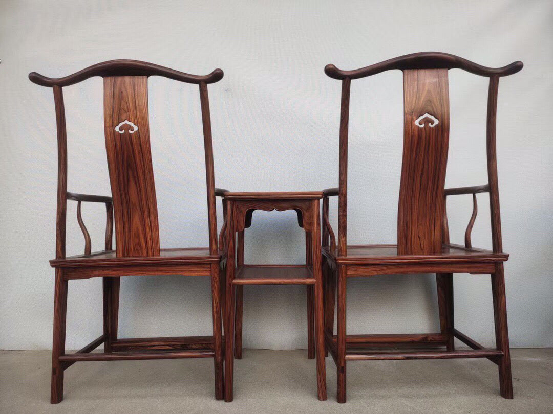 A set of Chinese antique rosewood official hat chairs